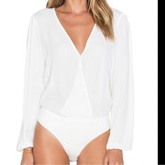 Lovers + Friends Vision Long Sleeve Bodysuit White Size M Self: 57% Viscose , 43% Rayon Contrast: 100% Rayon Hand Wash Cold Front Snap Closure Snap Crotch Closure Elasticized Sleeve Cuffs New Without Tags Chic V-neck Top With Lined Body, Chic V-neck Bodysuit For Day Out, Chic White V-neck Bodysuit, Chic Long Sleeve Bodysuit For Summer, White Long Sleeve Bodysuit For Work, Summer V-neck Bodysuit For Workwear, Feminine Bodysuit For Brunch, Summer Long Sleeve Bodysuit For Workwear, Elegant Bodysuit For Day Out