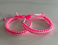 Handcrafted, long-lasting, colorful, fun, waterproof, adjustable bracelets that feature two colors of nylon cord. Bracelets are burned at the ends to ensure stability and longevity. Fun for everyone! Greensboro Nc, Cord Bracelets, Braided Bracelets, Adjustable Bracelet, Friendship Bracelets, For Everyone, Accessory Gift, Long Lasting, Pet Supplies