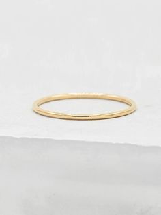 This stacking ring is the most basic ring you can own, but it's one of those rings that you can wear daily. It makes such a difference when you add it to your stack, but also, can give you that barely there, simplistic look. The ring is a 1mm thick gold filled ring. It's great for everyday wear and is fairly tarnish resistant if taken care of well. Please read my shop policies to learn more about the composition and proper care for each item purchased. All plated jewelry from our shop are eligib Basic Ring, Midi Rings Gold, Birthstone Stacking Rings, Gemstone Rings Vintage, Gold Rings Simple, Midi Ring, Gold Filled Ring, Pave Ring, Ring Fit