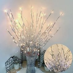 a vase filled with lots of white lights on top of a table