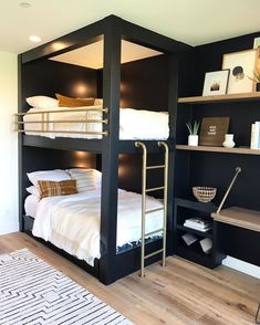 a bedroom with bunk beds and shelves in it