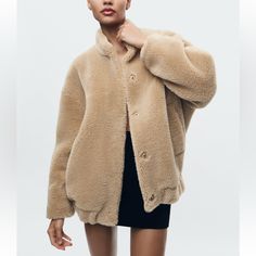 Genuine Zara New With Tag Color: Sand Brown Mock Neck Bomber Jacket. Long Sleeves, Front Pockets, Snap Button Closure And Elastic Hem. Lined. Roomy Fit. Stay Warm & Chic! Beige Faux Fur Coat For Workwear, Beige Faux Fur Lined Coat For Work, Chic Mink Outerwear For Work, Chic Mink Colored Outerwear For Work, Chic Zara Fur Coat For Fall, Zara Outerwear With Faux Fur Lining For Fall, Zara Beige Outerwear With Faux Fur Lining, Beige Outerwear With Faux Fur Lining, Zara Faux Fur Outerwear