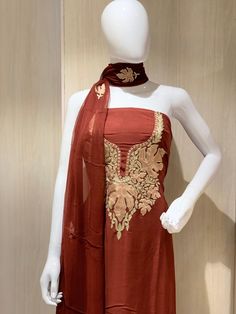 A stunningly marvellous outfit featuring Kashmiri Aari and Tilla fusion Embroidery. - - - - - - - - - - - - - - - - - - - - Product Details- Condition: Brand New- Colour: Red/Green/Grey/BeigeF A B R I CShirt: Monga CottonDupatta: ChiffonLower: Monga CottonF I N I S HUnstitched/Semi-StitchedYou can get it stitched locally.47+ inches of Shirt Length and up to full sleeves length.StitchedWant something ready to wear, we can stitch it for you. Let us know the type of lining you require (cotton or sh Indian Party Wear Suits, Kashmiri Suits, Party Wear Suits, Suits Indian, Embroidery Product, Indian Party, Indian Party Wear, Designer Salwar, Boho Scarfs