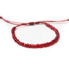 These single strand beaded bracelets are a great complement to any of the bracelets in the America Collection. Friendship Bracelets With Adjustable Waxed Cord And Round Beads, Adjustable Waxed Cord Friendship Bracelets With Round Beads, Adjustable Round Beads Waxed Cord Bracelets, Red Beaded Bracelet With Adjustable Cord, Adjustable Round Beads With Sliding Knot, Red Casual Beaded Bracelet With Adjustable Cord, Casual Red Beaded Bracelet With Adjustable Cord, Casual Waxed Cord Jewelry With Round Beads, Hand-strung Bracelets With Round Beads On Waxed Cord