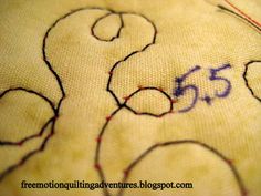 a close up view of the stitching on a piece of fabric that has been embroidered onto