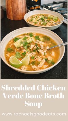 shredded chicken and vegetable bone broth soup in a white bowl with limes on the side