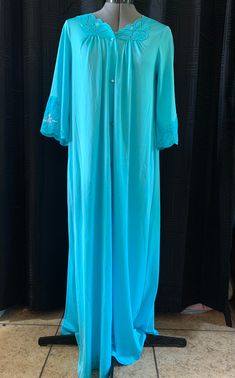 Bright blue with embroidered details, size S but fits me at an XL Blue Long Sleeve Bedtime Dress, Blue Nightgown For Loungewear, Blue Long Sleeve Nightgown For Sleepover, Long Sleeve Blue Nightgown For Sleepover, Blue Nightgown For Spring Loungewear, Light Blue Long Sleeve Nightgown For Spring, Light Blue Long Sleeve Nightgown For Bedtime, Light Blue Long Sleeve Loungewear Dress, Blue Cotton Nightgown For Spring