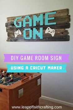 a diy game room sign using a cricut maker and wood planks