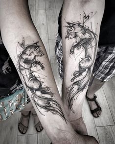 two people with matching tattoos on their legs