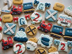 decorated cookies are arranged on a table