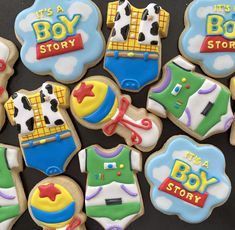 decorated cookies with the words it's a boy story on them