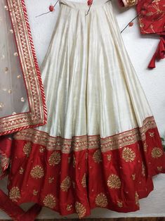 Red and White Minimalist Silk Lehenga for Modern Brides Product Specification Color: White and red (colors can be adjusted upon request) Fabric: Silk Occasion: Bridal, Engagement, Formal Event, Reception, Wedding Style: Lehenga Choli w/Dupatta Work: Gold Zardozi work Mix your glamour with the conventional bridal red on your D-day in this minimalist and elegant red and white bridal lengha which is intricately hand-embroidered in minimal zardozi goldwork. Minimal Bridal Look Features: Bicolor - mo Red And Gold Lehenga Simple, White And Red Lehenga Brides, Cream And Red Lehenga, Red And White Indian Outfit, Red White Lehenga Choli, Simple Bride Lehenga, White Bridal Lehenga With Red Dupatta, Red Plain Lehenga, Red Lehanga Outfits Simple