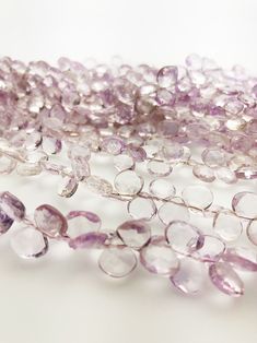 Pink Amethyst Flat Faceted Round Gemstone Beads, Semi Precious Gemstone Half off sale! Normally sold at $66.00 a strand.  Sold by the strand.  Specifications: Gemstone: Pink Amethyst  Shape: Flat Faceted Round, side drilled Size: 8mm Strand Length: 8" ----------------------------------------------------------- We ship in 1 to 3 days from Hawaii by First Class Airmail. Shipping to the USA usually takes 3 to 5 days. We import these Tahitian pearls straight from the crystal-clear lagoons of French Polynesia. Over the last 10 years of working with Tahitian pearl farmers and auction houses in Tahiti we are able to give our clients a large selection of Tahitian Pearls to choose from with competitive prices and excellent quality. Our office is in Hawaii on the island of Oahu. We are open Monday t Purple Rondelle Gemstone Beads, Rondelle Amethyst Gemstone Beads, Amethyst Rondelle Gemstone Beads, Faceted Amethyst Beads, Faceted Round Amethyst Beads, Round Faceted Amethyst Beads, Amethyst Gemstone Beads, Purple Round Gemstone Beads, Purple Faceted Beads Amethyst Gemstones