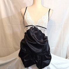 Nwt Black Pajama Short Set Sexy Adult White Lace Nightie Teddie Lingerie Medium Size Tag States M / L Included: Black Satin Cami W/ White Lace Matching Shorts W/ Lace Trim Black Satin Sleepwear With Lace Trim, Black Satin Camisole Sleepwear, Black Coquette Sleepwear For Wedding Night, Black Satin Sleepwear For Wedding Night, Black Camisole For Wedding Night, Black Satin Party Sleepwear, Black Satin Sleepwear For Night, Black Sleepwear With Built-in Bra For Bedtime, Winter Lounge