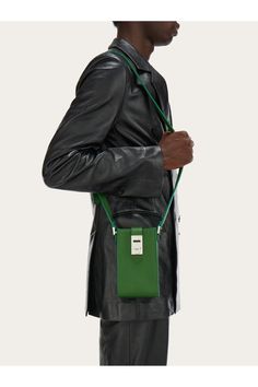 Shop the Crossbody pouch Forest green on Ferragamo.com. Discover the iconic collection on our official online shop now. Free Delivery. Ferragamo Men, Latest Bags, Silver Logo, Free Style, Green Man, Leather Pouch, Black Bag, Pouch Bag, Hands Free