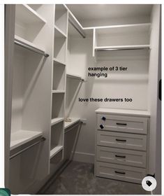 an empty walk in closet with white shelving and drawers on the bottom shelfs