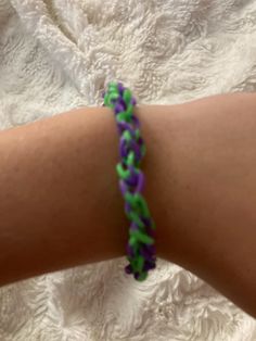 Green and purple rubber band bracelet Casual Purple Hypoallergenic Bracelets, Trendy Handmade Purple Wristband, Casual Purple Hypoallergenic Jewelry, Rainbow Loom Bracelets Easy, Bracelets Easy, Rubber Band Bracelet, Rainbow Loom Bracelets, Purple Bracelet, Rainbow Loom