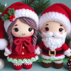 two crocheted christmas dolls sitting next to each other