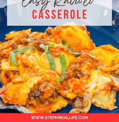 a blue plate with lasagna casserole on it and the title overlay says easy ravioli casserole