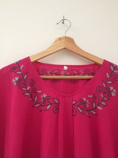 This is a poncho top or dress made with good quality cotton fabric which is delicately embroidered with a contionous floral design. It has been cut in a beautiful u shape at the bottom which will give a nice flow to the top. It's ideal for summer, you can wear it at home to lounge around in or use it as a top over your jeans. It will even work ideally over your swim suit as a cover up. Available in 3 colours and many sizes. We do S/M , L/XL, and XL/XXL. Pink V-neck Top For Beach Cover-up, Pink V-neck Beach Cover-up Top, Pink V-neck Tunic For Beach Cover-up, Pink Cotton Tunic Top, Pink Free Size Bohemian Cover-up, Pink Bohemian Free Size Cover-up, Pink Tunic Top For Summer, Bohemian Pink Free Size Cover-up, Pink Cotton Summer Tunic