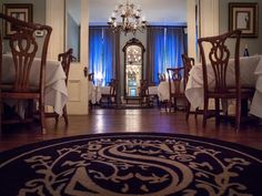 the dining room is clean and ready for us to eat in it's placemats