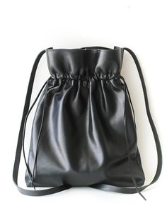 Designer Black Leather Drawstring Backpacks for women. Convertible Backpack - Leather Crossbody Bag, Handcrafted from the softest natural leather. Modern Soft Leather Backpack For Errands, Chic Soft Leather Crossbody Backpack, Chic Leather Tote Backpack With Adjustable Strap, Chic Leather Crossbody Backpack For Daily Use, Modern Soft Leather Crossbody Backpack, Leather Tote Backpack With Detachable Strap, Versatile Leather Satchel With Dust Bag, Versatile Leather Backpack, Chic Everyday Leather Backpack With Soft Leather