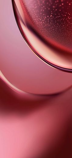 an abstract pink and red background with some gold circles on it's side, as well as the bottom part of the image