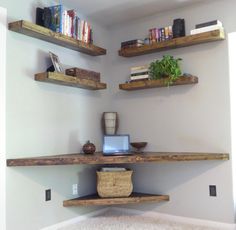 the shelves are made out of wood and have books on them