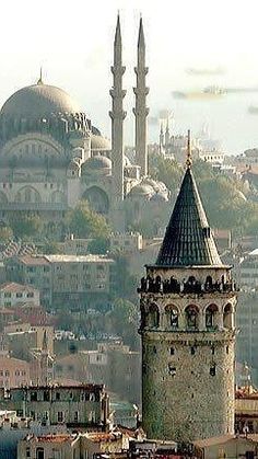 an old city with many buildings and towers