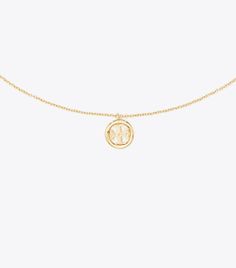 Miller Pendant Necklace: Women's Designer Necklaces | Tory Burch Gold Medallion Necklace With Logo Charm, Elegant Yellow Gold Charm Necklace With Logo, Gold Pendant Necklace With Logo Charm, Gold Necklace With Initial Pendant And Logo Charm, Yellow Gold Medallion Jewelry With Logo Charm, Classic Yellow Gold Necklace With Logo Charm, Yellow Gold Medallion Necklace With Logo Charm, Yellow Gold Brass Jewelry With Logo Charm, Gold Necklace With Logo Charm And Round Pendant