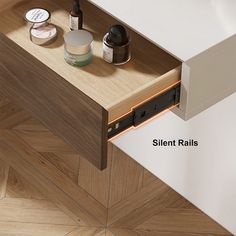 an open drawer with some skin care products on it and the words silent rails below