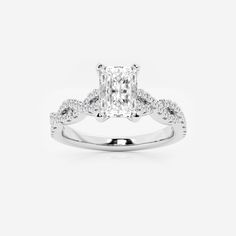 an engagement ring with a princess cut diamond in the center and pave set shoulders