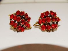 "Circa 1920's Gold Tone Czechoslov designer Red Earrings. 0.95\" x 0.70\" size." Retro Red Earrings For Formal Occasion, Retro Red Clip-on Earrings For Formal Occasions, Red Retro Earrings For Formal Occasions, Retro Red Formal Earrings, Antique Red Earrings For Anniversary, Vintage Red Clip-on Earrings For Evening, Red Clip-on Earrings For Anniversary, Antique Red Earrings For Formal Occasions, Vintage Red Clip-on Earrings For Anniversary