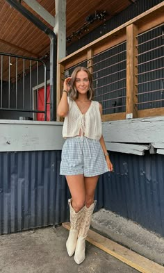 We LOVE boxer shorts and couldn't wait for these to hit the floor. The light blue and white with a checkered design is screaming summer on the lake. Pair her with a baby tee or any oversized shirt for the cutest look. Model is 5'3 with a 32B bust, 26" waist, 36" hips, and wearing a small. Model typically wear a 0/2. This item runs true to size. Jean Top And Skirt Outfit, Blue And White Boxer Shorts Outfit, Punchy Western Fashion, August Fashion 2024, Coastal Cowboy Outfit, Checkered Shorts Outfit, Texas Outfits Summer, Summer Lake Outfits, Summer Fair Outfit