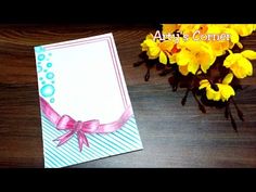 a greeting card with yellow flowers in the background