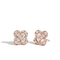 A stylish pair of clover studs encrusted with 1.30ctw of round and baguette diamonds. Beautifully crafted in 14K rose gold with diamonds of G-I color and I1 clarity. Rose Gold Baguette Diamond Earrings For Anniversary, Fine Jewelry Rose Gold Baguette Diamond Earrings, Rose Gold Diamond Earrings With Baguette Diamonds, Rose Gold Baguette Diamond Earrings, Luxury Rose Gold Baguette Diamond Earrings, Lighthouse Point, Baguette Diamonds, Baguette Diamond, Round Diamonds