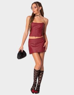 This Faux Leather Mini Skirt Is The Ultimate Go To Piece For All Your Spring/summer Plans. This Classic Staple Will Go With Everything In Your Closet, So You'll Never Be Left Wondering What To Wear. Mini Skirt. Zip Back Closure. 50% Polyester Urethane, 50% Polyester. Model Wears Size S. Model Height Is 5'8. | Edikted Aster Faux Leather Mini Skirt Modern Corset, Leather Fits, Graphic Trends, Faux Leather Mini Skirt, Leather Mini Skirt, Leather Corset, Swimwear Dress, Metallic Dress, Leather Mini Skirts