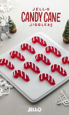 there are many candy canes on the tray