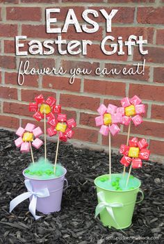 two buckets filled with marshmallows and candy are sitting in front of a brick wall that says, easy easter gift flowers you can eat