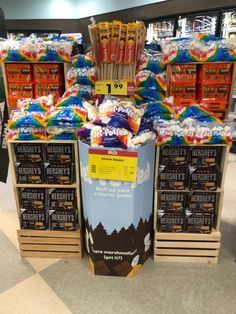 an assortment of snacks on display in a grocery store