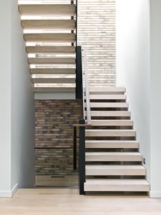 the stairs are made of wood and metal