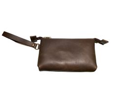 This wristlet is perfect for carrying your essentials in style. It's made of oil tanned leather that has a rich and natural look. The wrist strap is detachable, so you can use it as a clutch or a pouch. The zipper closure keeps your items secure and easy to access. Wristlet comes in two sizes, 6.5" x 5.0" x 2.25, which is spacious enough for your phone and keys, and 8.5" x 5.5" x 2.25" which will hold a phone, keys, a wallet and more. Measurements are approximate and each wristlet is unique. Han Leather Bag With Wrist Strap For Gift, Leather Wristlet With Wrist Strap For Everyday Use, Brown Leather Wristlet For Everyday Use, Brown Wristlet With Adjustable Strap For Everyday Use, Leather Wrist Strap Pouch For Daily Use, Leather Pouch With Wrist Strap, Brown Pouch With Wrist Strap For Daily Use, Leather Wristlet With Wrist Strap, Brown Clutch Pouch With Wrist Strap