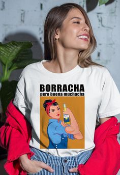 Borracha pero Buena Muchacha shirt, Regalos en Español, Latina shirt, Funny Spanish shirt, La loteria shirt, Spanish shirt, Corona shirt.   The unisex heavy cotton tee is the basic staple of any wardrobe. It is the foundation upon which casual fashion grows. All it needs is a personalized design to elevate things to profitability. The specially spun fibers provide a smooth surface for premium printing vividity and sharpness. No side seams mean there are no itchy interruptions under the arms. The Funny Spanish Words, Loteria Shirts, Funny Spanish, Spanish Shirts, Word Shirts, Outfit Primavera, Spanish Humor, Painted Clothes, Raleigh Nc