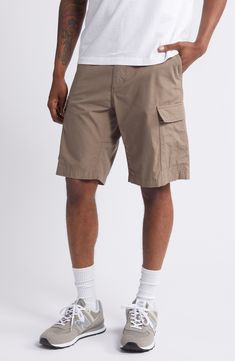 Lightweight cotton ripstop canvas brings both hardworking attitude and casual appeal to these comfy cargo shorts. 10" inseam; 22" leg opening; 11" front rise; 15" back rise (size 32) 100% cotton Machine wash, tumble dry Imported Utility Cotton Cargo Shorts With Multiple Pockets, Relaxed Fit Cargo Shorts With Cargo Pockets, Utility Cotton Cargo Style Shorts, Cotton Cargo Utility Shorts, Relaxed Fit Utility Bermuda Shorts With Cargo Pockets, Utility Style Bermuda Shorts With Cargo Pockets, Relaxed Fit, Utility Bermuda Shorts With Cargo Pockets And Relaxed Fit, Cotton Cargo Shorts With Patch Pockets For Outdoor, Short Cotton Cargo Pants With Cargo Pockets