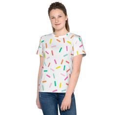 Get a t-shirt that your teen will love! This tee is a colorful statement piece that's made of a soft fabric and has an eye-catching design that won't fade.  * 95% polyester, 5% elastane (fabric composition may vary by 1%) * Fabric weight: 6.19 oz/yd² (210 g/m²) * Premium knit mid-weight jersey * Four-way stretch fabric that stretches and recovers on the cross and lengthwise grains * Regular fit * Blank product components in the US and Mexico sourced from the US * Blank product components in the Ice Cream Tshirts, Ice Cream Cone Costume, Ice Ice Baby Tshirt, Cupcake Tshirt, Cardboard Props, Playful Cotton Rainbow T-shirt, Fun Cotton T-shirt With Unicorn Print, Ice Cream Sundae, Costume Halloween