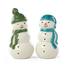 two ceramic snowmen wearing hats and scarves