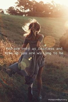 a woman walking through a field with the sun shining down on her head and text that reads, you are only as fearless and true as if you are wiling to be