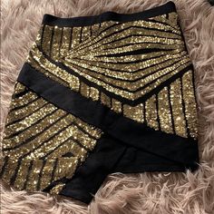 Never Worn Black With Gold Sequin Skirt Glamorous Black Stretch Mini Skirt, Black Bottoms For Club And Party Season, Black Sequined Mini Skirt For Club, Black Sequin Skirt For Club, Black Sequined Skirt For Club, Black Mini Skirt For Party Season, Black Mini Length Bottoms For Party Season, Glamorous Black Mini Skirt, Fitted Black Shorts For Party