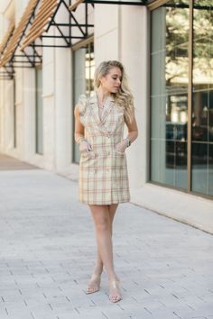 The retro-inspired Renee dress has a flattering fit with a double-breasted silhouette, side pockets and a notched lapel collar. The ruffled sleeves add to the charm of this mini plaid dress making it perfect for both Easter and Spring. Preppy Mini Dress For Fall, Elegant Plaid Mini Dress, Casual Plaid Office Dress, Preppy Dresses For Fall Workwear, Elegant Mini-length Plaid Dress, Elegant Mini Length Plaid Dress, Preppy Dresses For Work In Fall, Elegant Plaid Dresses With Ruffles, Preppy Mini Dress For Work