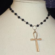 Large Ankh Cross Pendant Choker Necklace. Made With Black Glass Beads & Finished With Chain In The Back. Measures Approximately 14 Inches. Has A Lobster Clasp And 1.5 Inch Extension Chain. #Rosary #Choker #Cross #Goth #Grunge Black Metal Necklaces With Silver Beads, Silver Cross Jewelry With Black Beads, Black Metal Necklace With Silver Beads, Black Necklace With Silver Beads, Nickel-free Black Beaded Necklace As Gift, Nickel-free Black Beaded Necklace Gift, Nickel-free Black Beaded Necklace, Nickel-free Black Beaded Necklace For Gift, Black Ankh Necklace In Metal